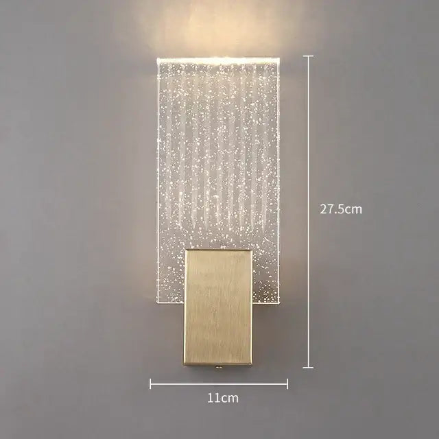 Modern gold and clear glass led wall lamp with rectangular acrylic panel and brushed gold base for bedroom sconce lighting