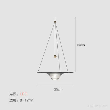 Modern gold and clear glass pendant lights featuring a sleek clear glass pendant with golden sphere for bedroom decorbites