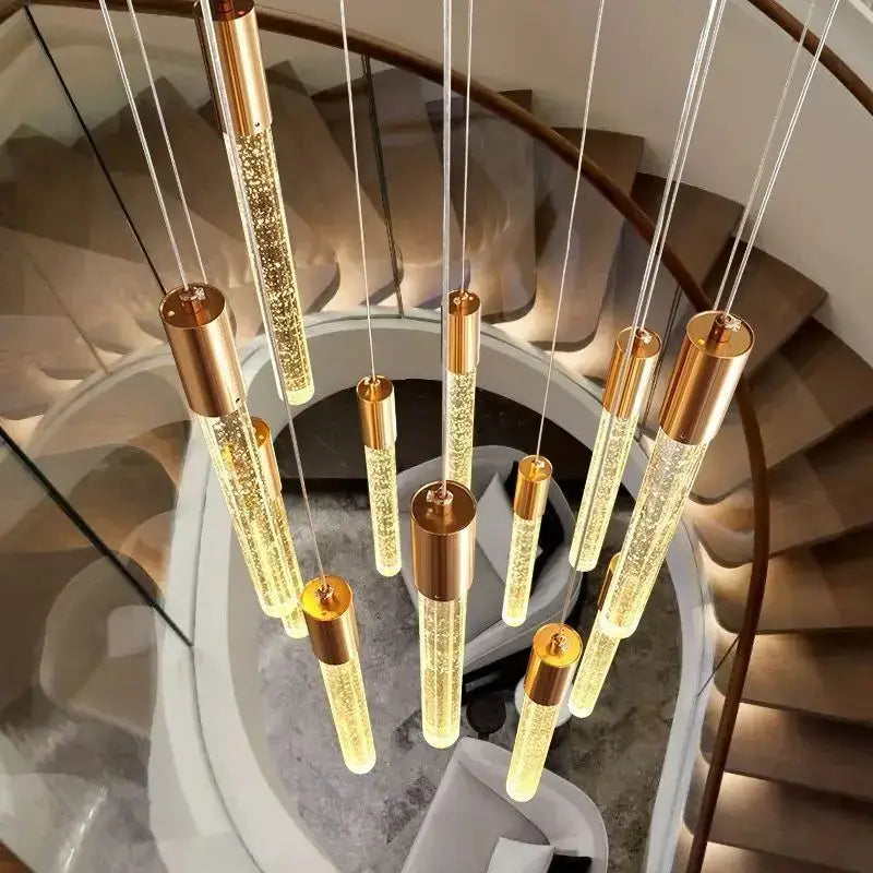 Modern gold and crystal cylindrical stair chandelier with sparkling internal glass tubes by decorbites cylindrical stair design