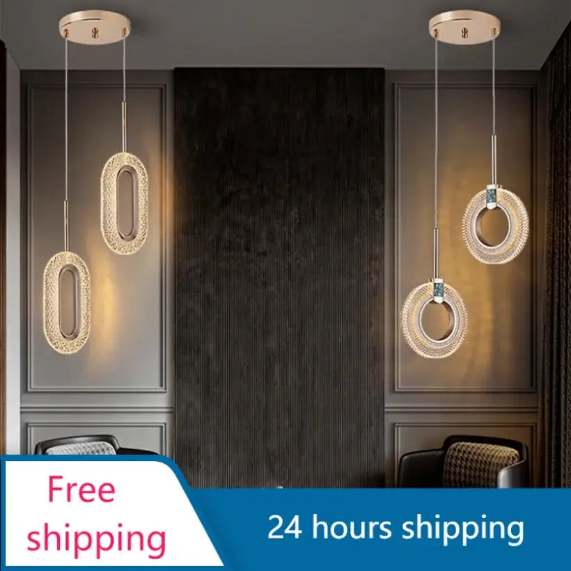 Three modern gold and crystal oval bedside pendant lights with metal frame hang from ceiling for bedroom decor