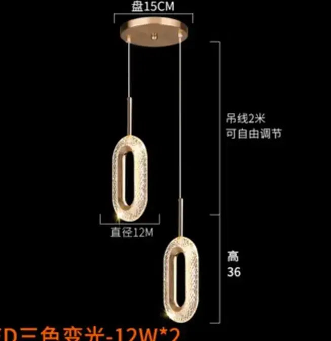 Modern gold and crystal oval bedside pendant light with textured crystal design and adjustable 2-meter cords
