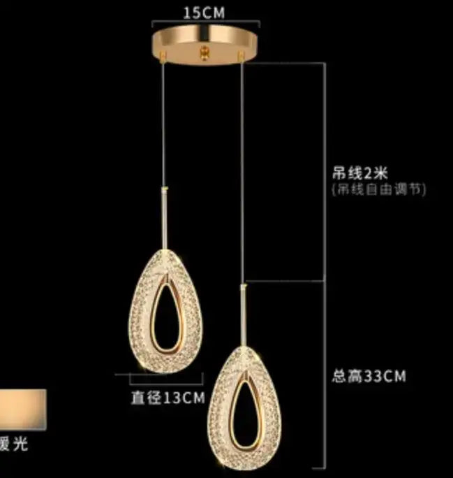 Modern gold and crystal oval bedside pendant light with teardrop glass shades and adjustable 2-meter hanging chain