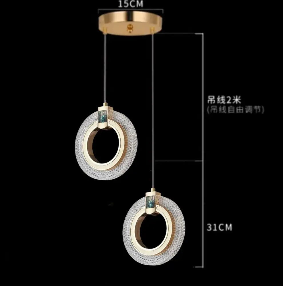 Modern gold and crystal bedside pendant light with textured rings and adjustable 2-meter suspension cords