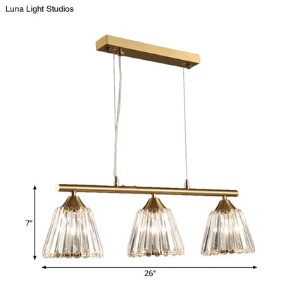 Modern gold pendant light with three clear crystal shades suspended from a brass bar 220v-240v for dining room