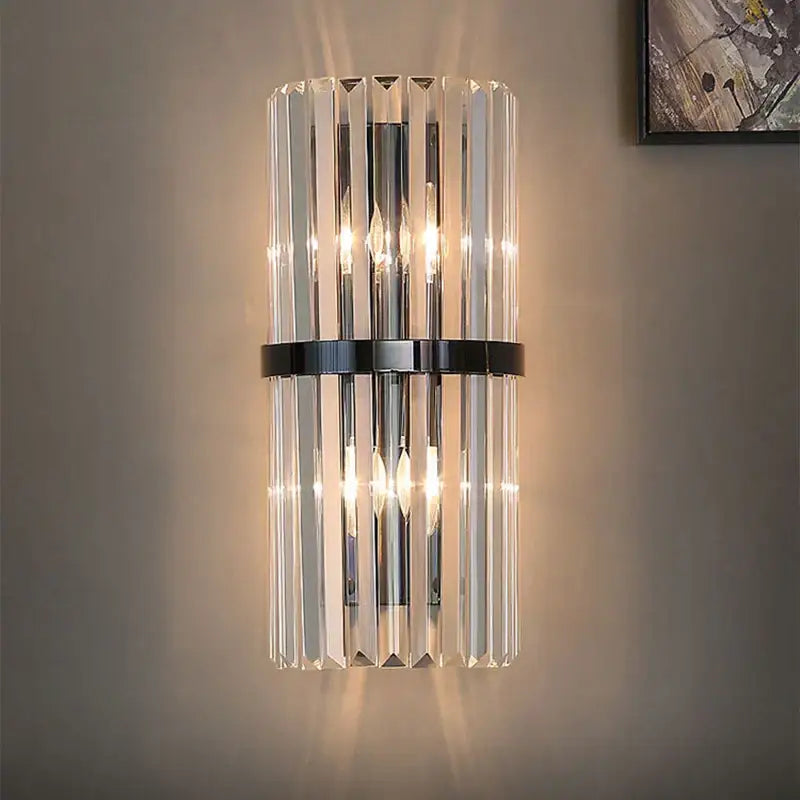 Modern gold and crystal wall light featuring vertical crystal rods with sleek chrome and black accents for living room decorbites crystal wall