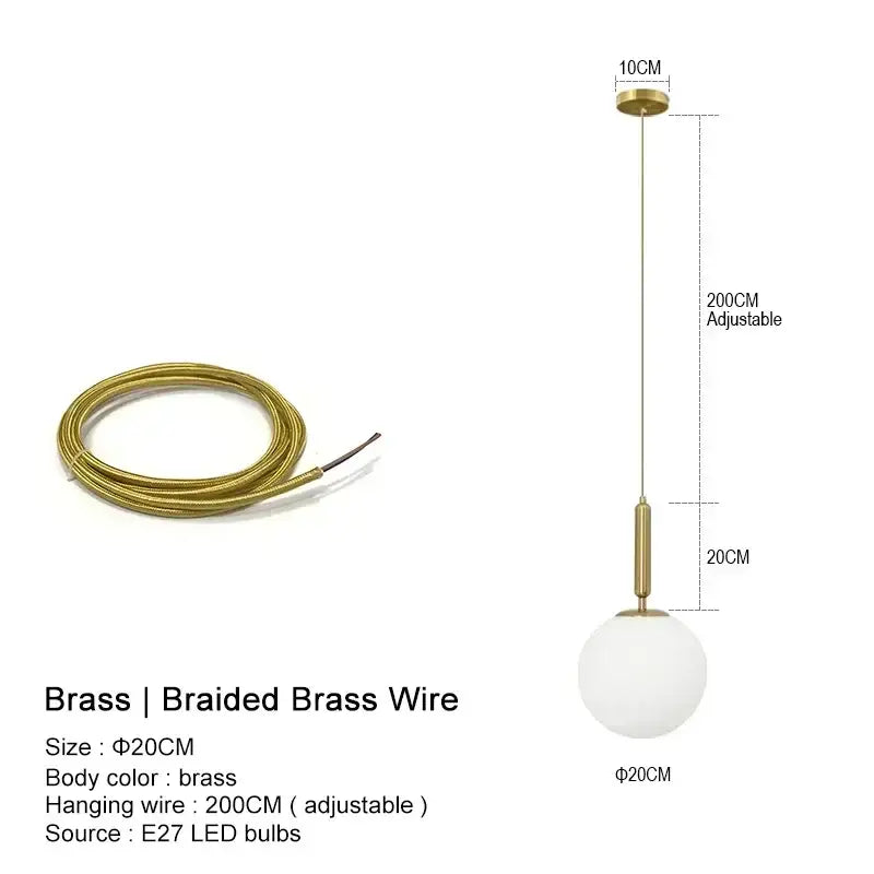 Modern gold-toned brass braided wire pendant light with frosted glass globe for kitchen island lighting