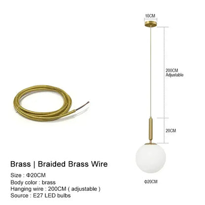 Modern gold-toned brass braided wire pendant light with frosted glass globe for kitchen island lighting