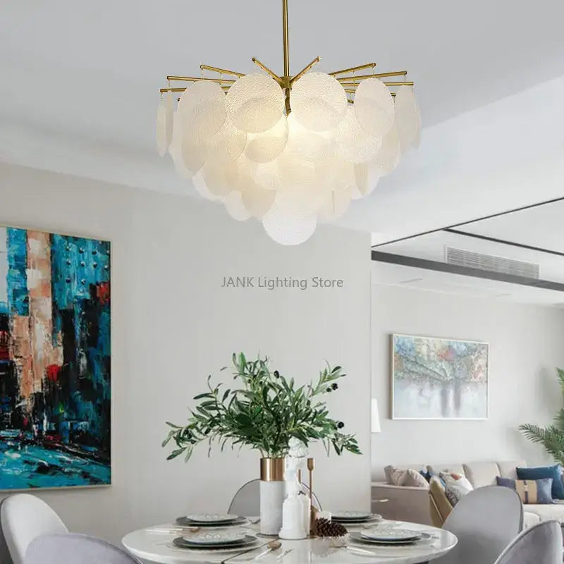 Modern gold and frosted glass led chandelier with overlapping circular shades for dining room lighting