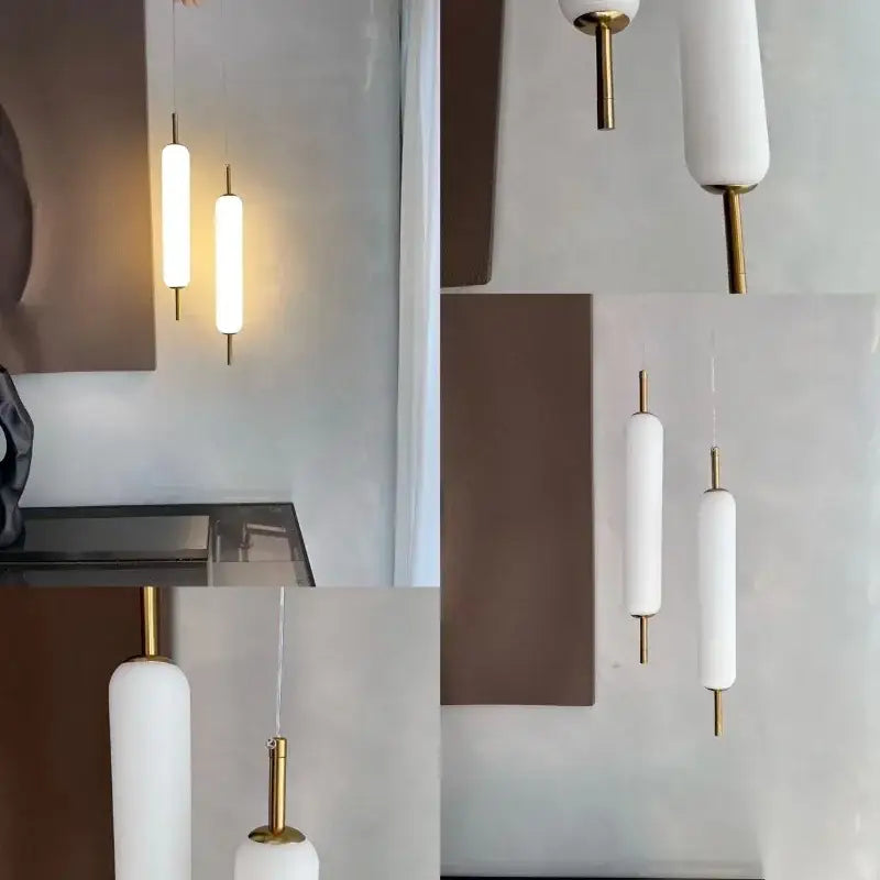 Modern gold and frosted glass led pendant chandelier with white cylindrical shades and gold-toned fixtures for living room