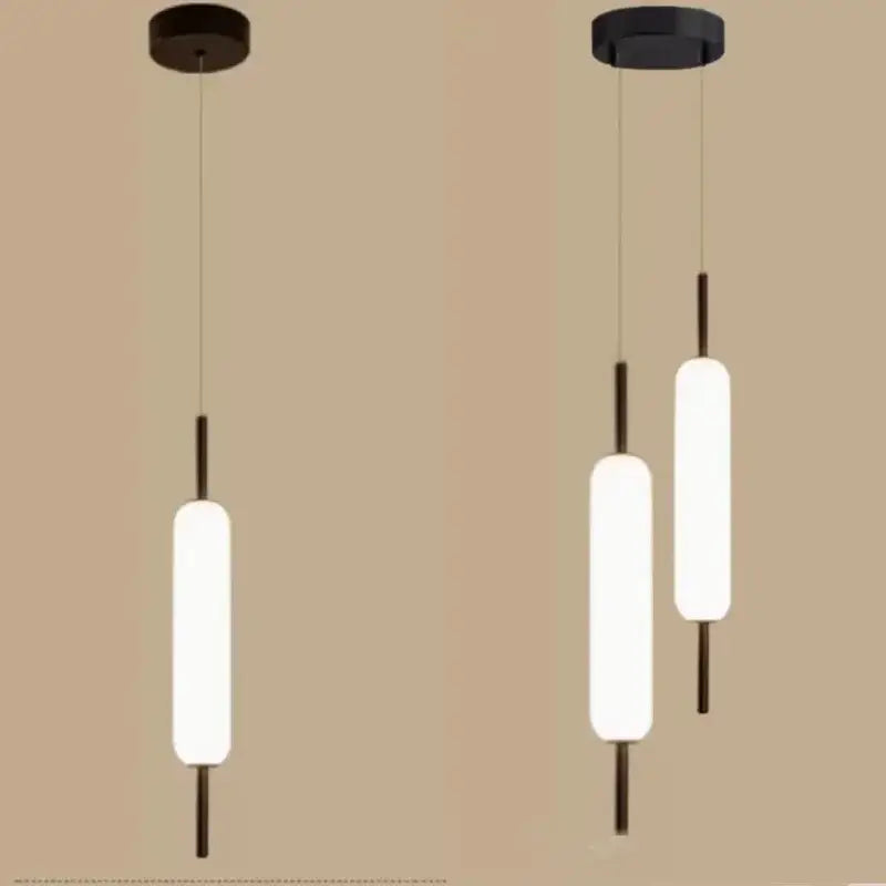 Modern gold and frosted glass led pendant chandelier featuring sleek black metal and white glass led pendant shades