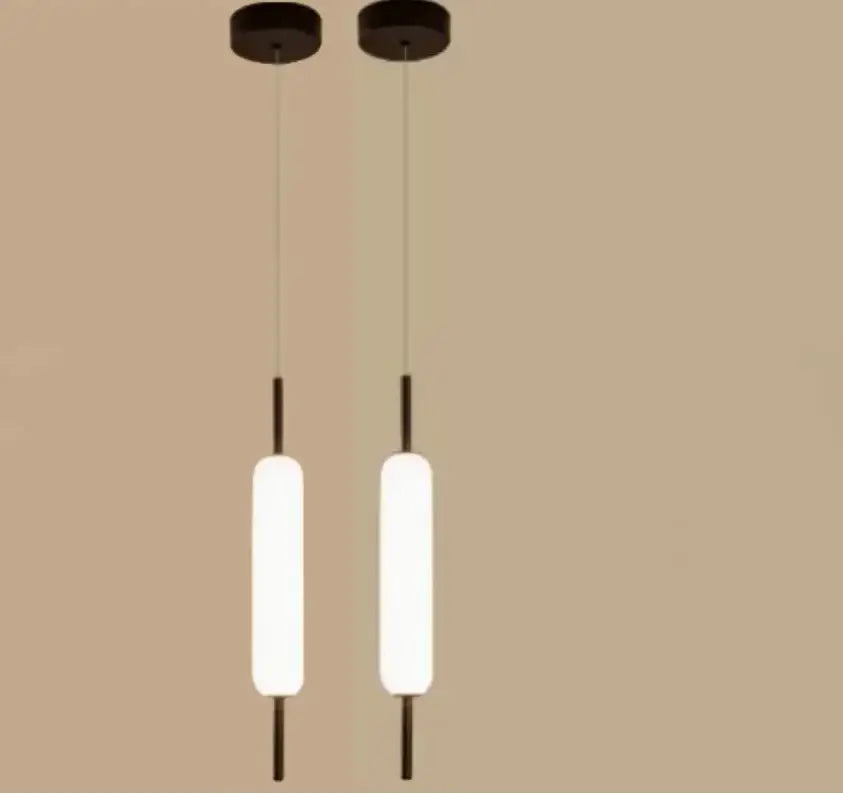 Modern gold and frosted glass led pendant chandelier with black circular fixtures and glowing white glass led pendant shades