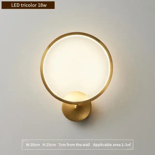 Modern gold and glass led wall lamps featuring a circular design with frosted diffuser and tricolor lighting for bedrooms