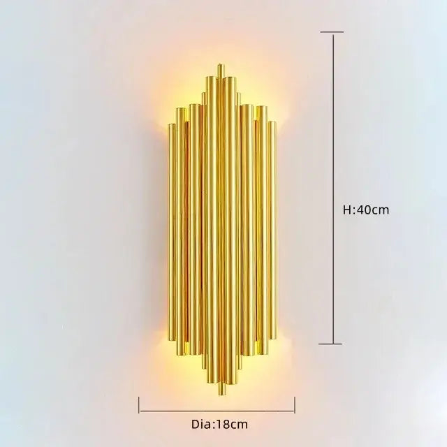 Modern gold and glass led wall lamp with golden metallic sconce and symmetrical vertical rods for bedroom lighting