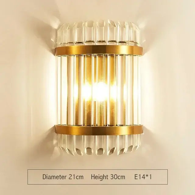 Modern gold and glass led wall lamp featuring gold-toned vertical crystal rods and fluted glass accents for bedroom use