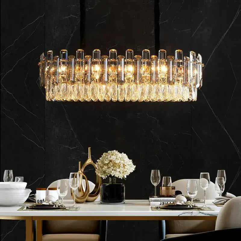 Modern gold and gray clear crystal pendant lamp with crystal k9 led prisms suspended above dining table