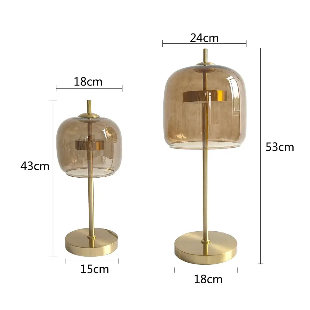 Two modern gold and gray glass table lamps with amber-tinted shades and metal bases for bedroom decorbites glass table use