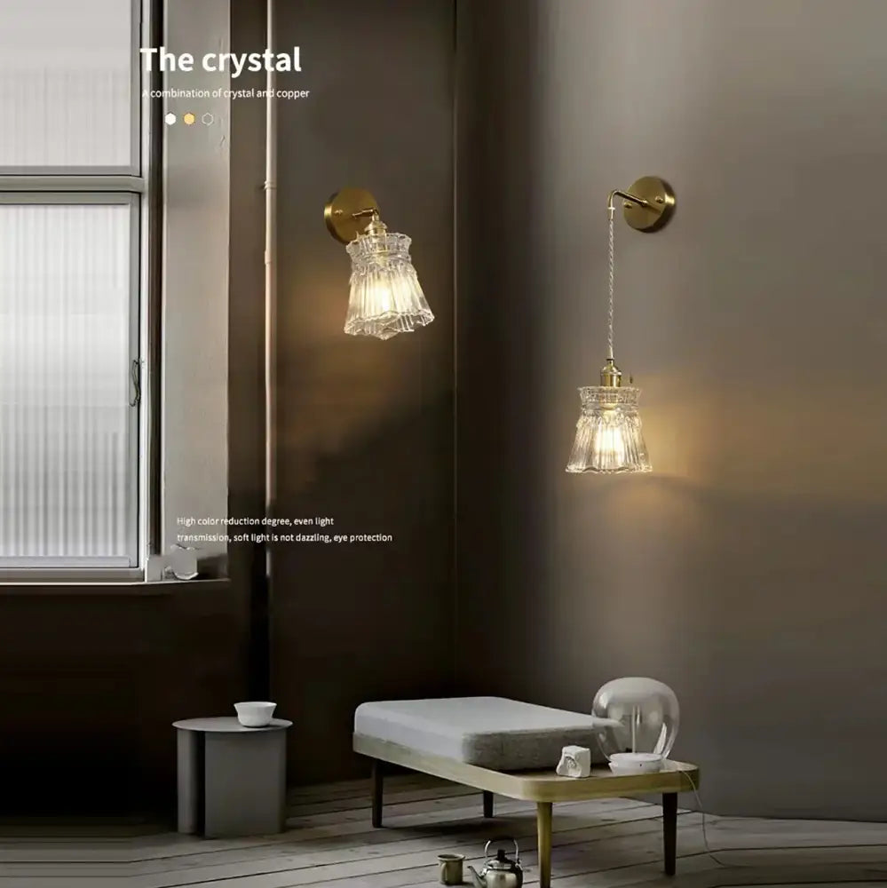 Modern gold and gray glass wall lamp with faceted crystal shades and warm brass finish for elegant interior lighting