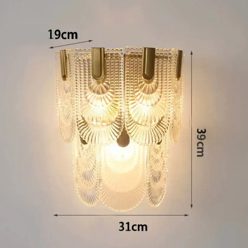 Modern gold and gray glass wall lamp featuring cascading tiers of clear faceted glass panels for living room use