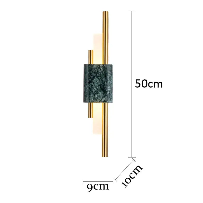 Modern gold and green marble wall lamp featuring a dark green marble cylinder and polished gold metal rods sconce