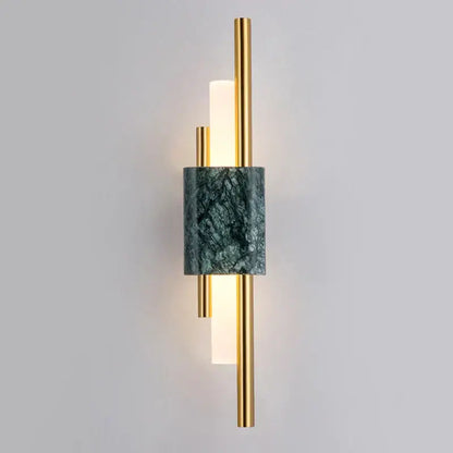 Modern wall lamp featuring gold-toned metal rods and a dark green marble accent band for bedroom use