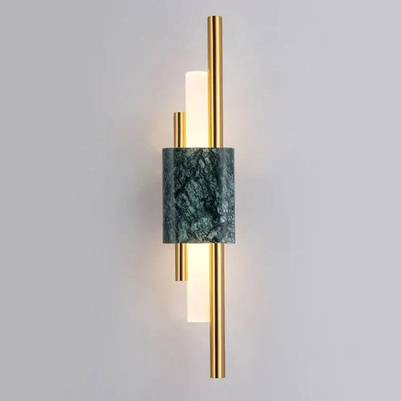 Modern wall lamp featuring gold-toned metal rods and a dark green marble accent band for bedroom use