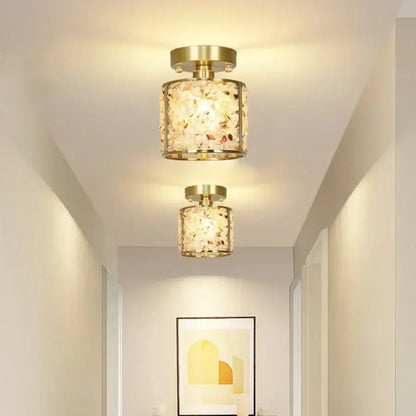 Modern gold and pale green glass mosaic ceiling light with gold-toned cylindrical design and decorbites copper canopy led