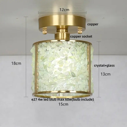 Modern gold and pink column glass crystal ceiling light with brass copper base and pale greenish illuminated body