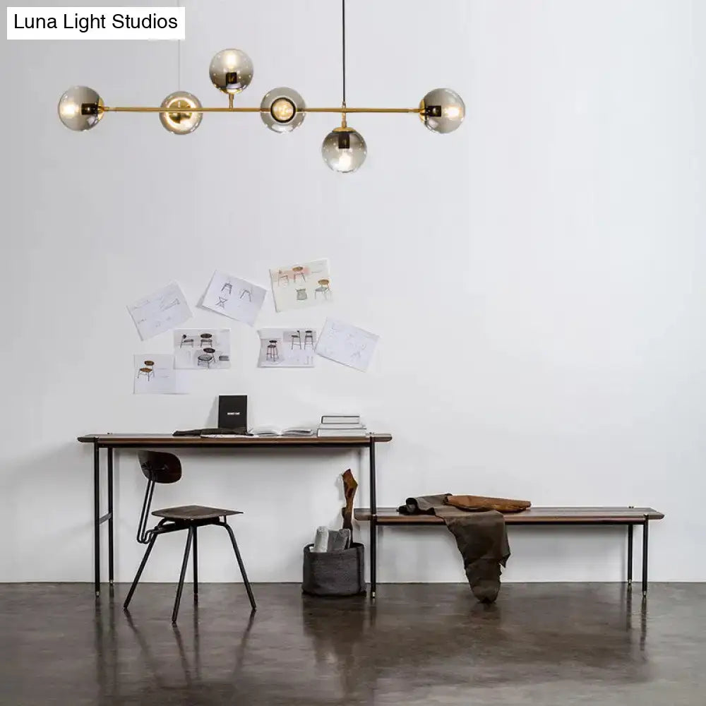 Modern gold and smoke gray linear globe hanging light fixture with spherical glass globes for dining room island 220v-240v