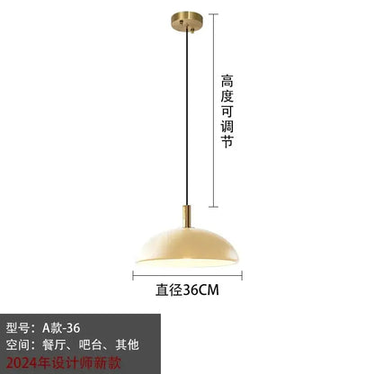 Modern gold glass pendant light with brass finish dome shade and adjustable height for kitchen dining room use