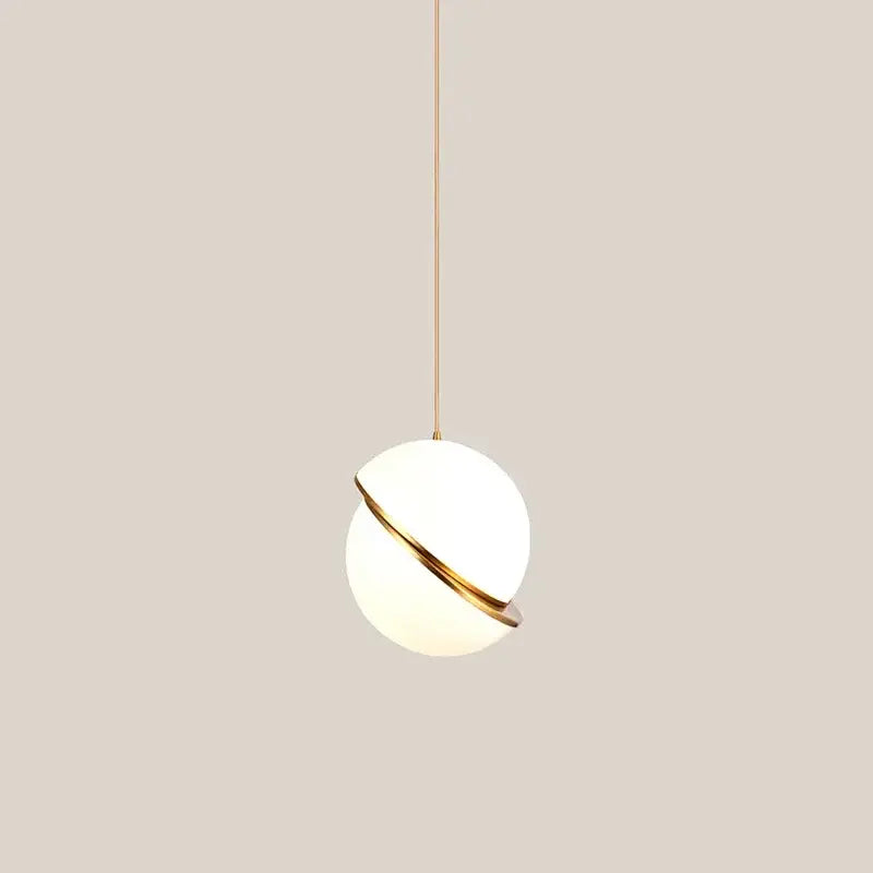 Modern gold and white ball pendant light with frosted globe and sleek ring, perfect decorbites golden ball chandelier