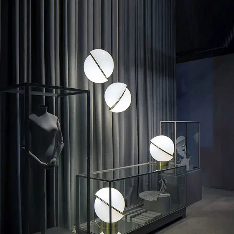 Modern gold and white ball pendant light with frosted glass shades and sleek metallic accents for dining room decorbites golden ball pendant