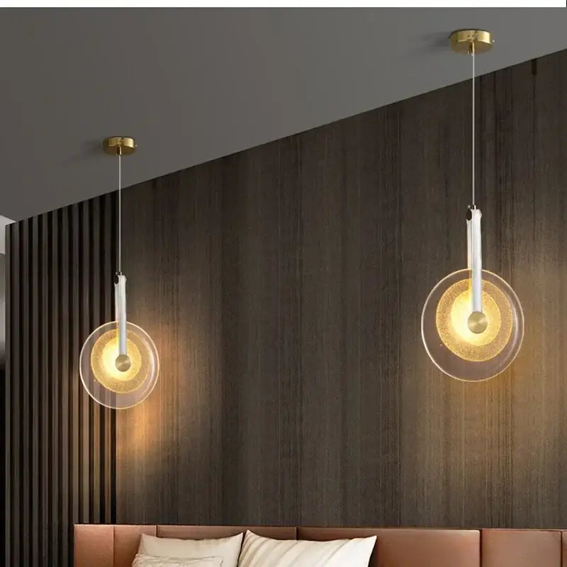Modern gold and white circular glass led chandelier with clear glass discs and gold-toned metal fixtures decorbites circular glass