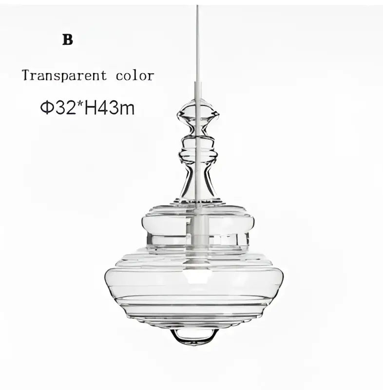 Transparent glass pendant light with tiered sculptural design and slender cord in modern gold and white decorbites glass chandelier