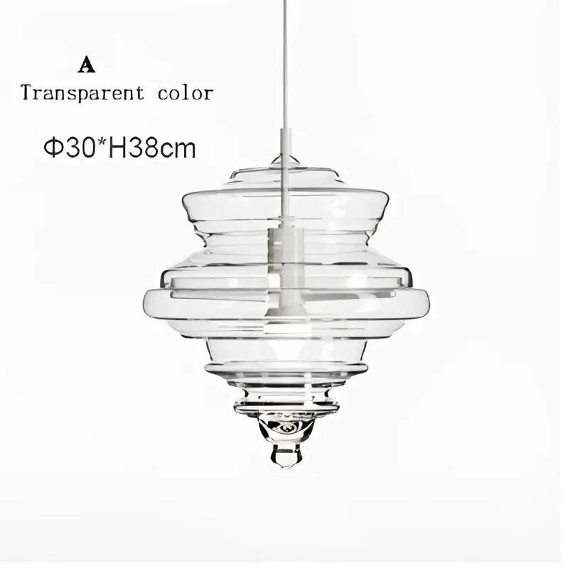 Modern gold and white decorbites glass chandelier featuring a clear glass tiered pendant light for dining rooms