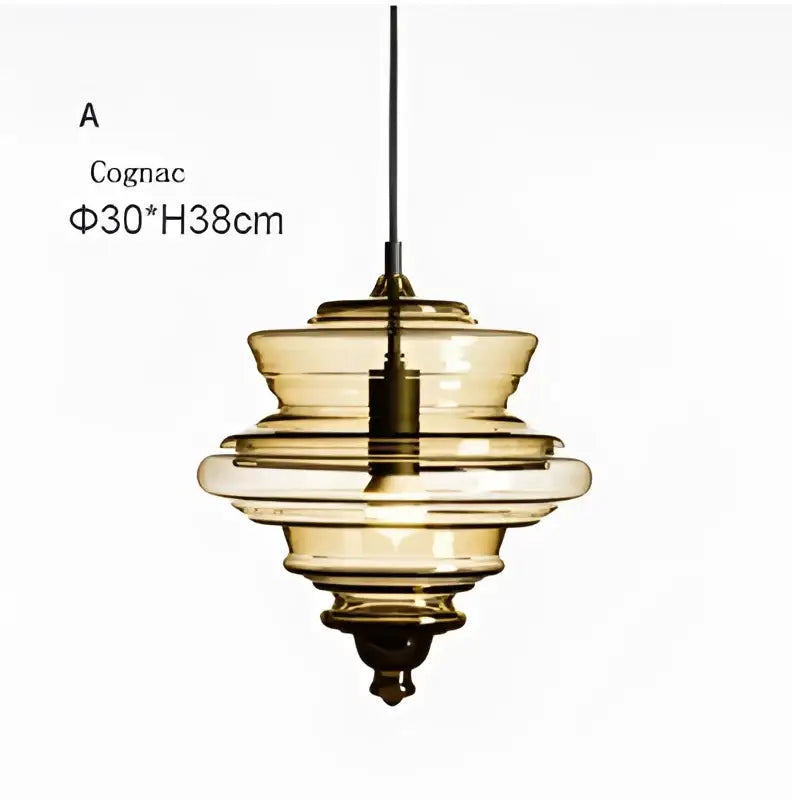 Modern gold and white decorbites glass chandelier featuring a cognac-colored tiered glass pendant light with sleek design