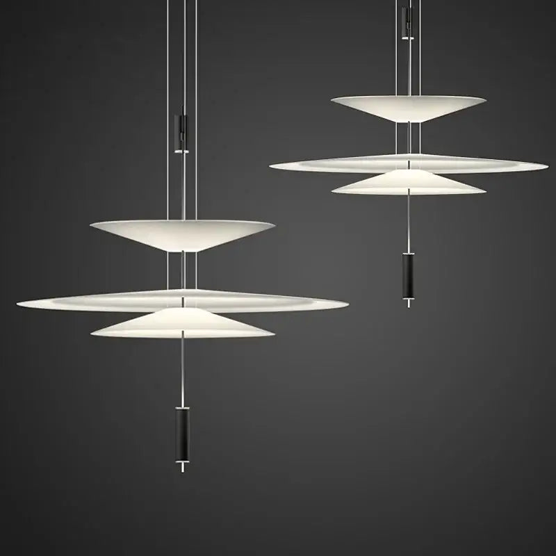 Modern white tiered pendant light with sleek black accents from decorbites designer saucer ufo collection for living room decor