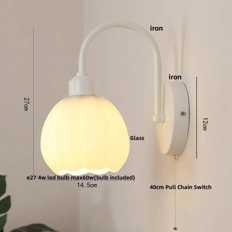 Modern gold and white glass wall lamp with a white iron wall sconce and frosted white glass shade decorbites iron white