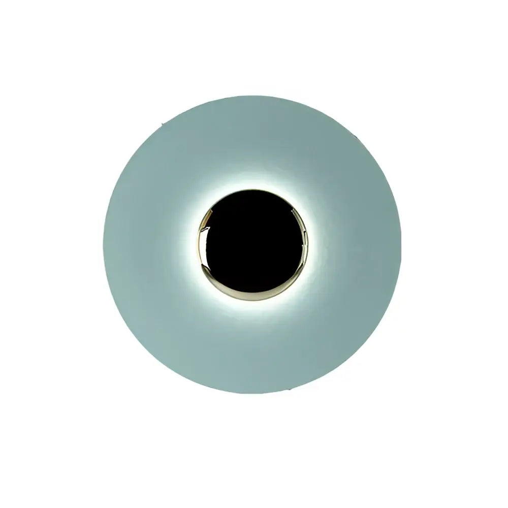 A modern led ufo wall light with a matte teal diffuser and polished chrome ring for bedside wall sconces decor