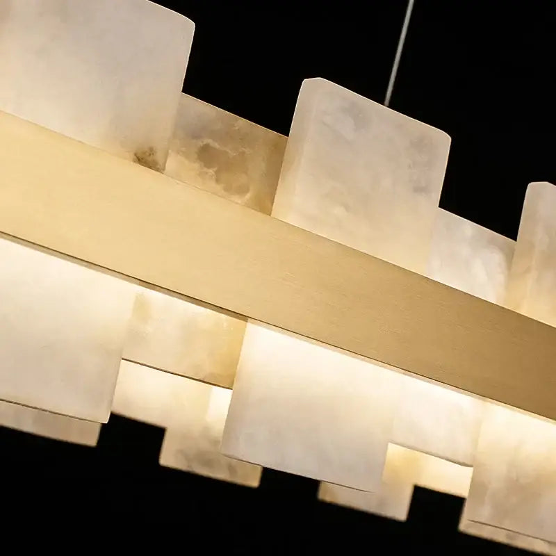 Modern gold and white marble bedroom chandelier led pendant lamp with translucent alabaster blocks on brushed brass bars
