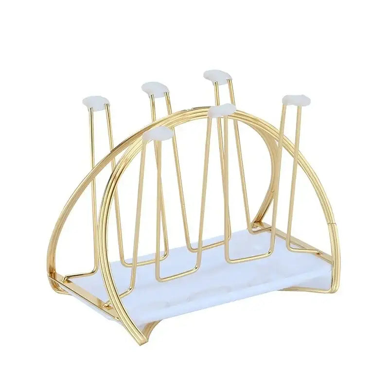 Modern gold and white marble mug holder stand with gold-toned metal cup holder and soft-touch silicone grips
