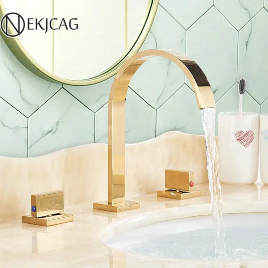 Modern gold arched dual handle basin faucet set with polished metallic finish for sleek bathroom use
