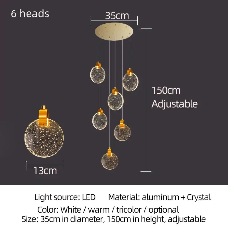 Modern gold attic crystal chandelier with six spherical glass shades and warm led lighting for dining room use