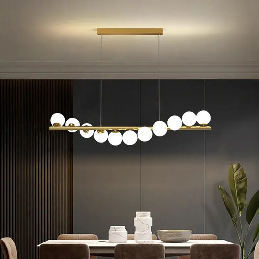 Modern gold ball g9 led ceiling chandelier featuring decorbites glass ball bulbs with sleek horizontal bar design