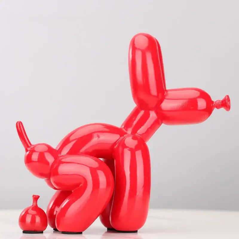 Vibrant red glossy balloon dog statue made of resin with a playful design suitable for modern living room decor