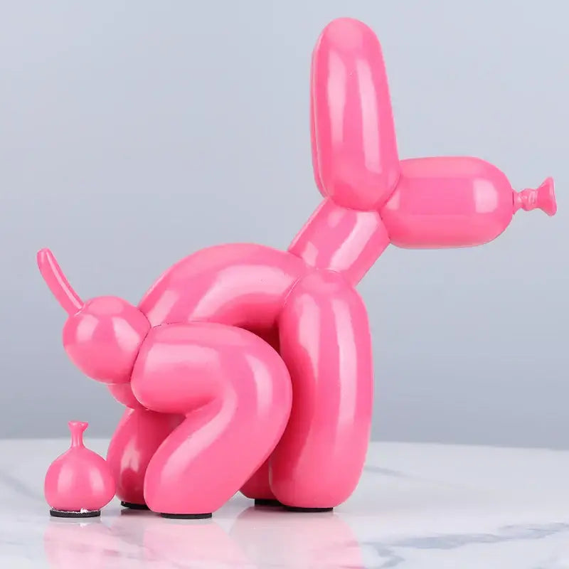 Glossy pink balloon dog statue with sleek inflated design and black rubber feet resin art sculpture for living room