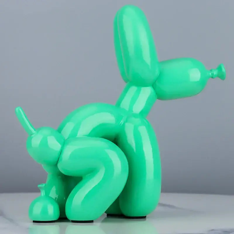 Glossy mint green balloon dog statue made of resin with a sleek modern design for living room decor