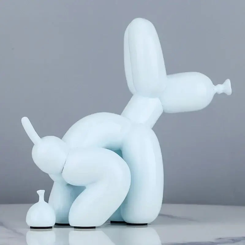 A sleek light blue resin balloon dog statue with glossy finish and minimalist design for modern living room decor
