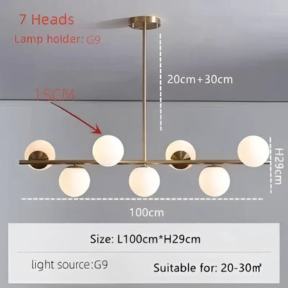 Modern gold bean glass chandelier with brass finish and seven frosted glass globes for dining room or living room lighting
