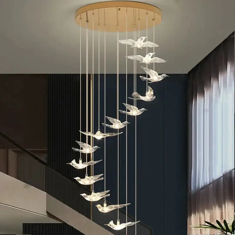 Modern gold bird design led chandelier with clear crystal bird figurines on wooden base for living room decorbites bird design