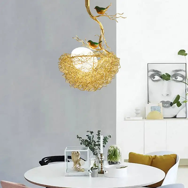 Modern gold bird nest glass pendant light with golden wire design and two small birds for dining room pendant lights